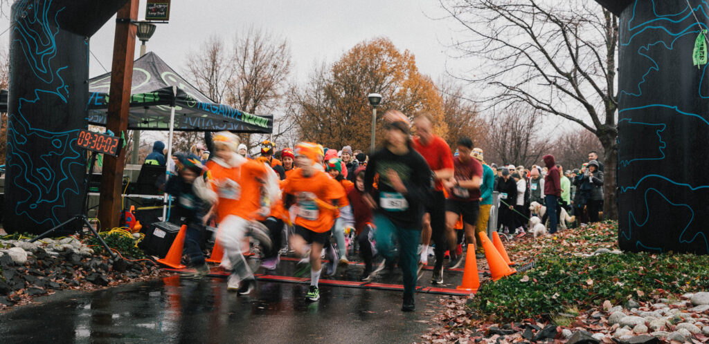 Runners race from the starting line