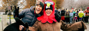 Woman dressed as turkey kicking off community run